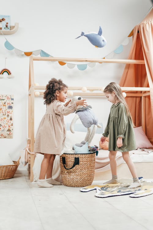 Free Girls Playing With Stuffed Toys Stock Photo