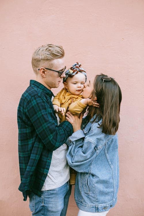 Mother Kissing Her Daughter