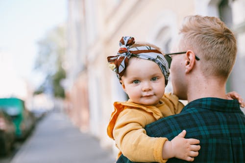 Father Carrying a Baby