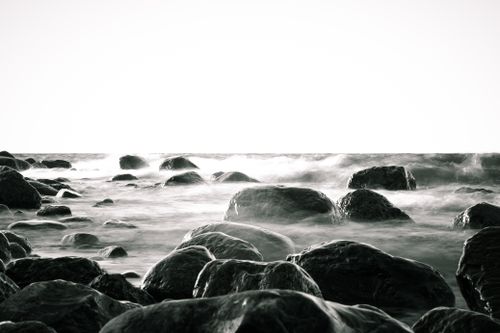 Free Dramatic long exposure image showcasing rocks in the Baltic Sea with misty waters. Stock Photo