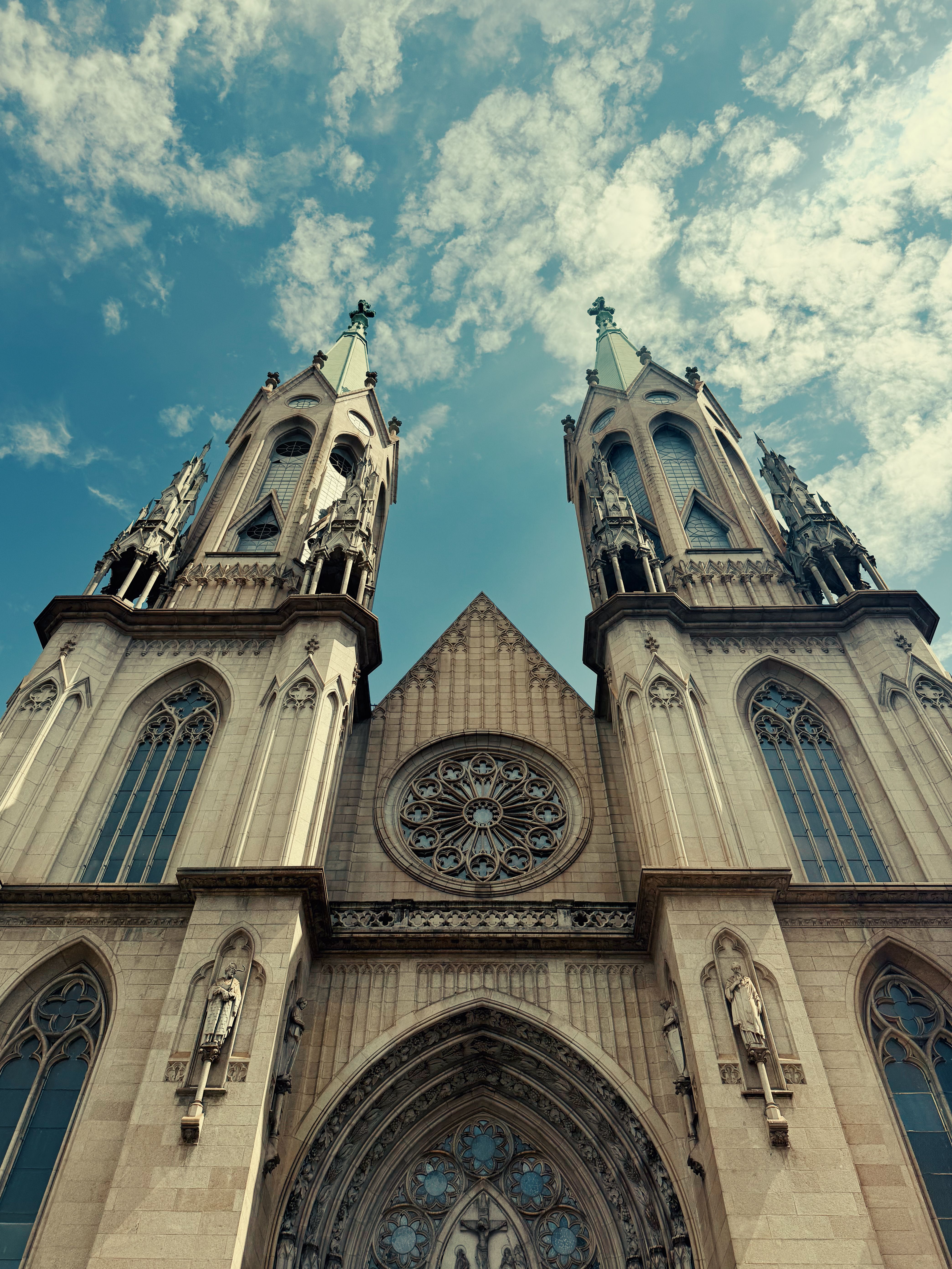 Gothic Architecture Church Facade Under Blue Sky · Free Stock Photo