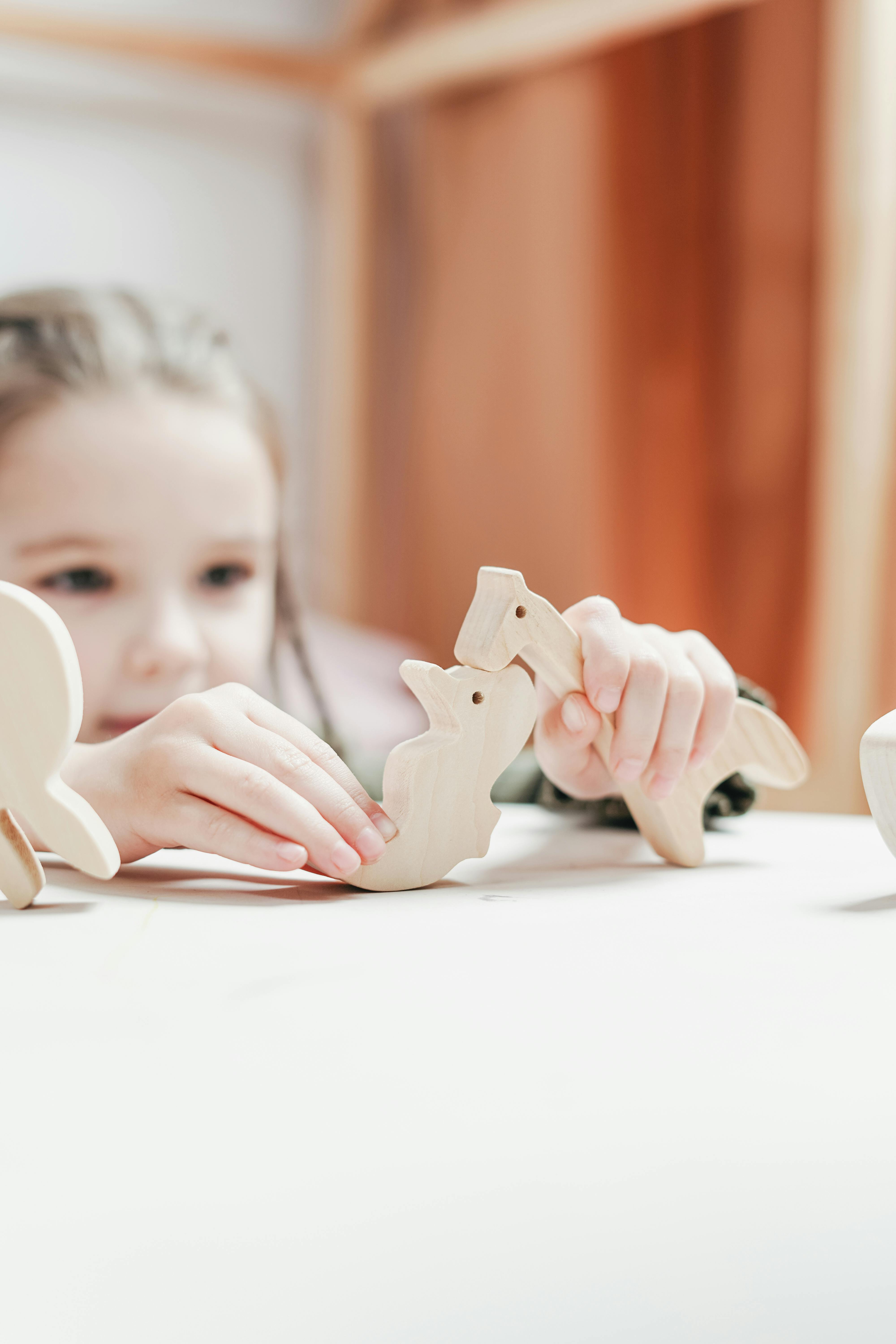 girl with toy animals