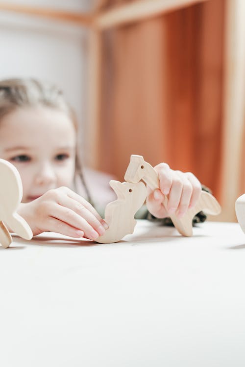 Free Girl with Toy Animals Stock Photo