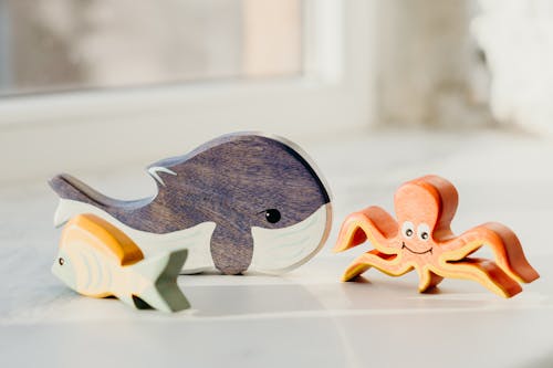 Foto d'estoc gratuïta de balena, enfocament poc profund, joguines de fusta