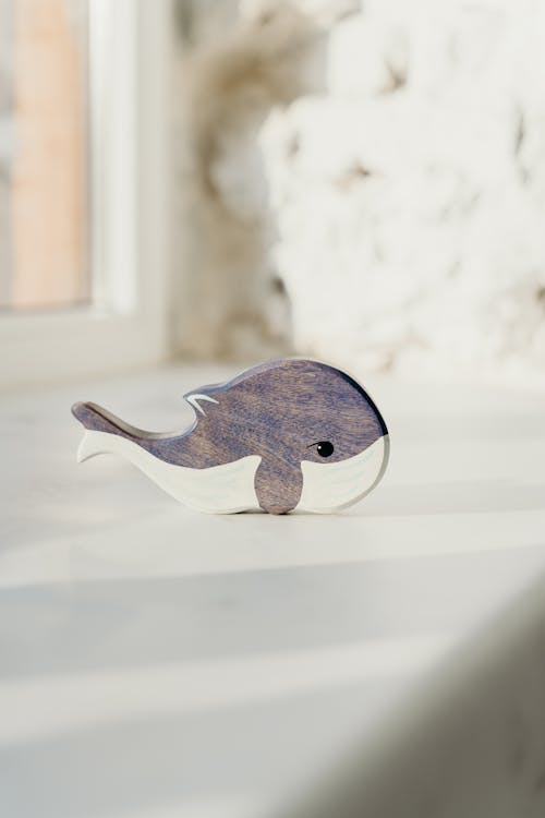 Free Shallow Focus Photo of Wooden Whale Toy Stock Photo