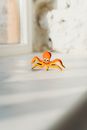 Shallow Focus Photo of Wooden Octopus Toy