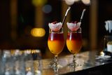 Two cocktails on a bar counter — photo by Mohamed Olwy on Pexels