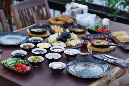 Free A vibrant and diverse Turkish breakfast spread outdoors, perfect for sharing. Stock Photo