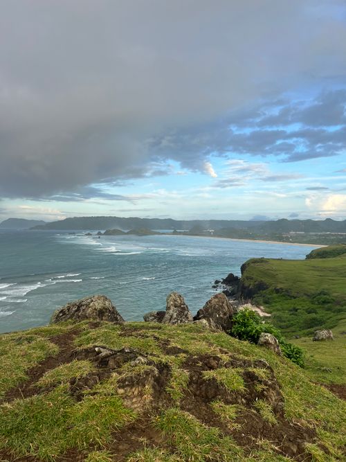 Free Stunning coastal view with rugged cliffs and rolling waves in Nusa Tenggara, Indonesia. Stock Photo