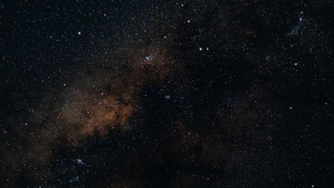 High-resolution image of a starry night sky featuring the Milky Way galaxy, showcasing celestial beauty.