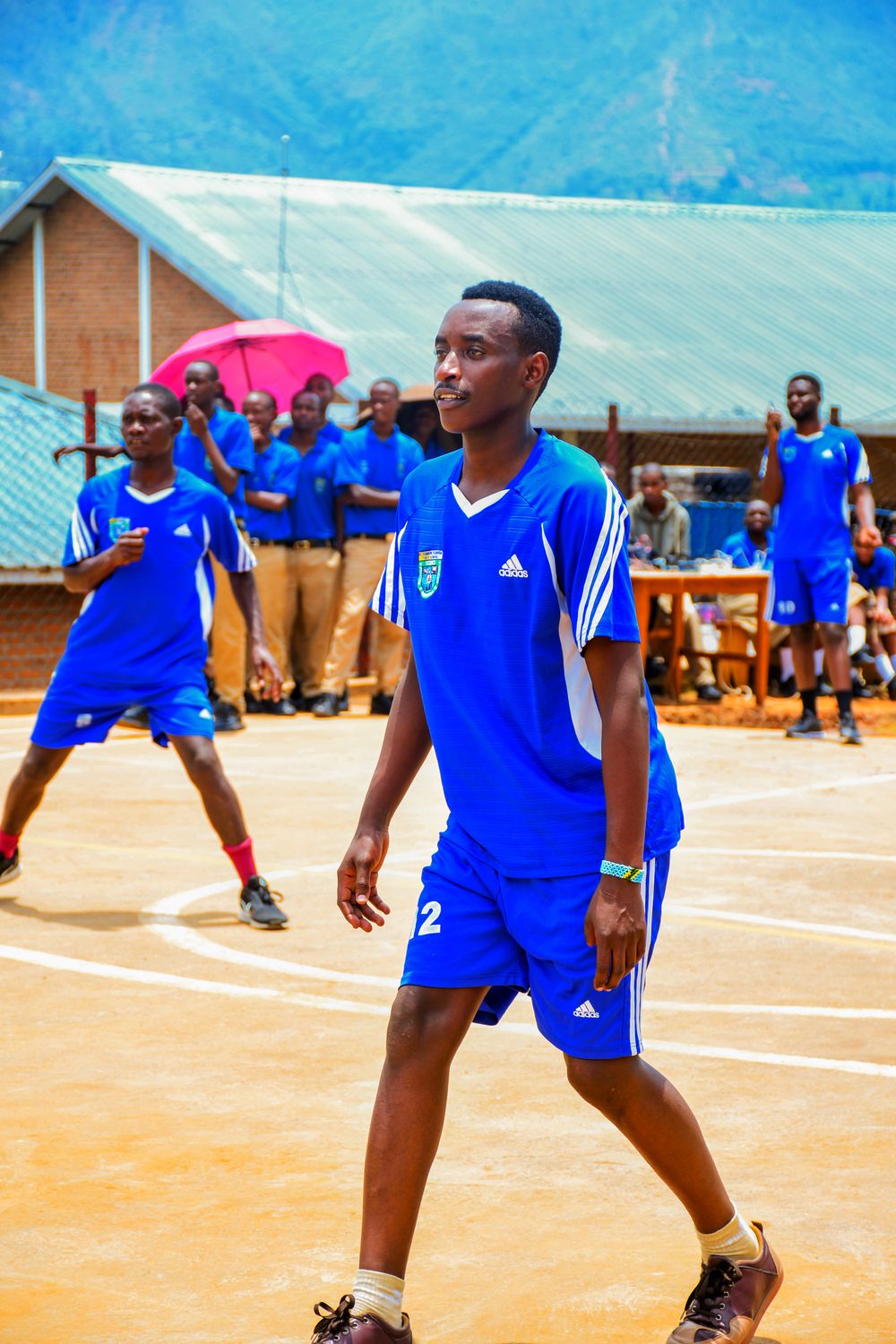 Basketball player wearing a blue team uniform