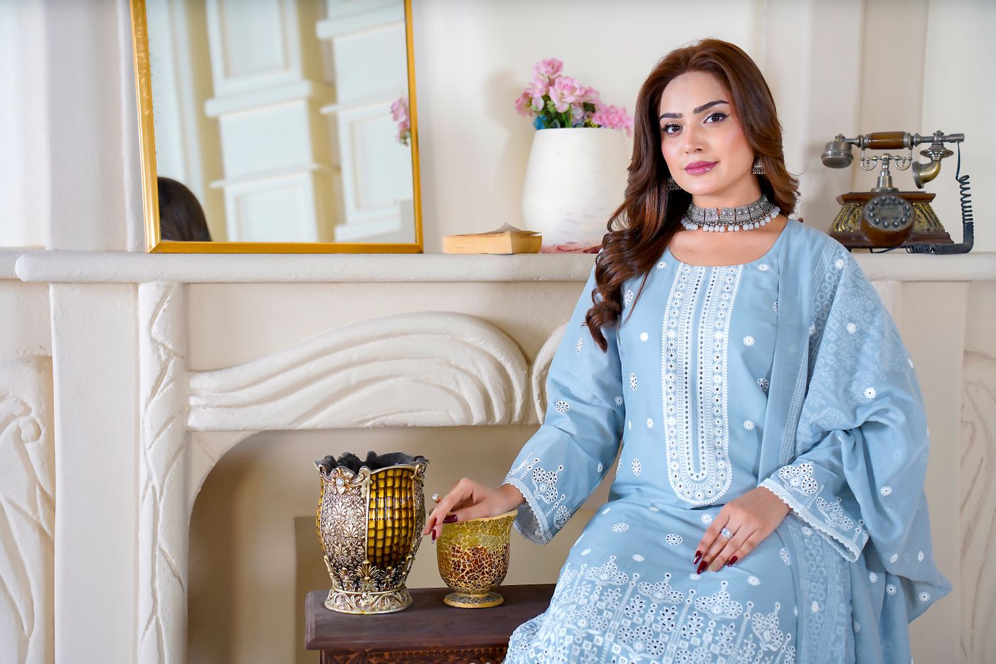 Pakistani fashion portrait in a warm vintage interior