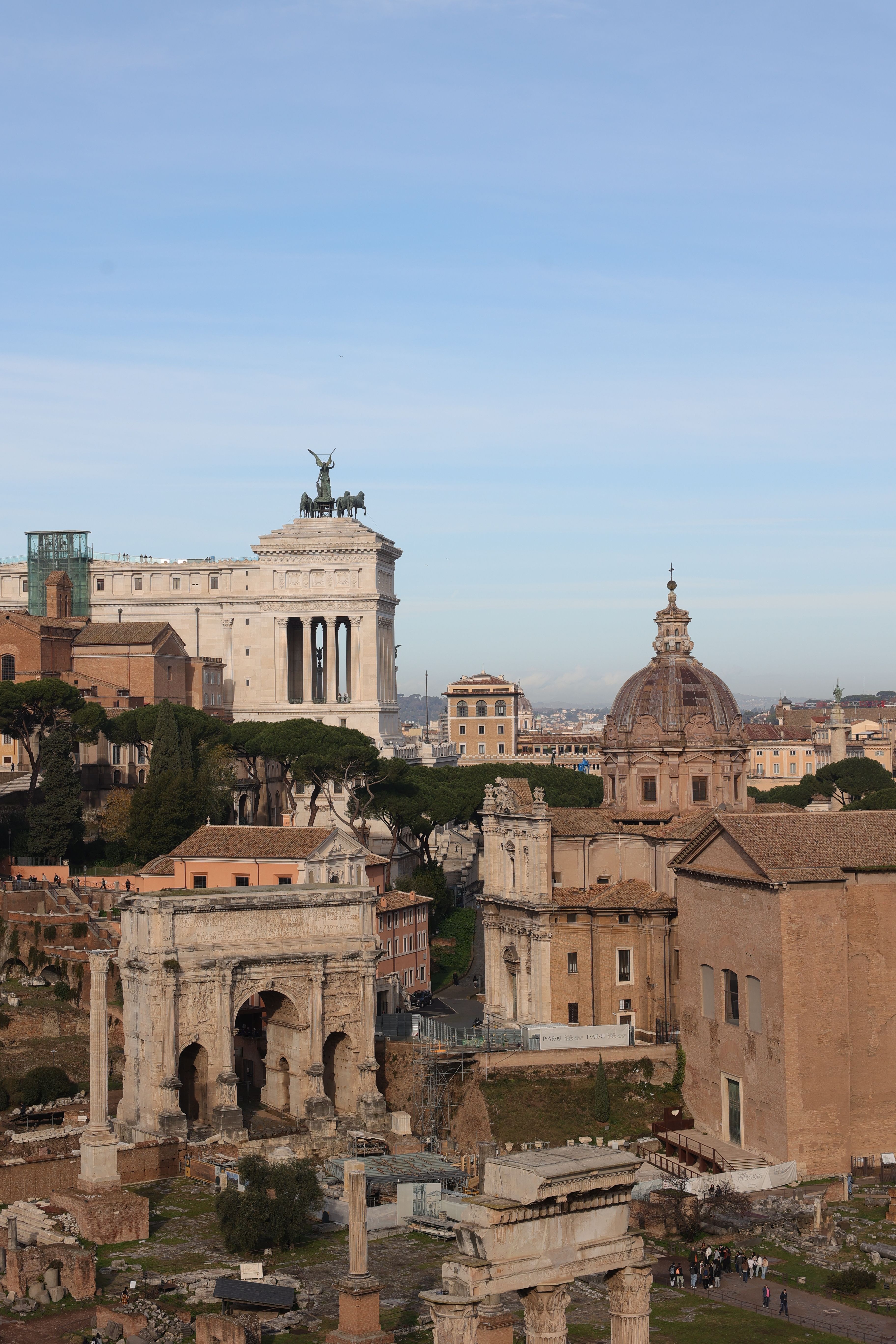 Stunning aerial view of the historic Roman Forum and Altare della Patria in Rome, Italy.