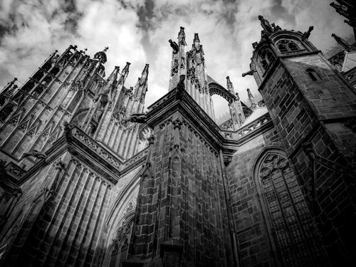 Free Striking view of a Gothic cathedral with intricate architecture under a cloudy sky. Stock Photo