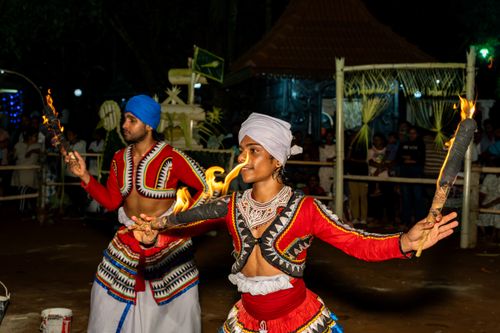 Free Cultural dancers performing with fire torches at a festival in Gampaha, Sri Lanka. Stock Photo