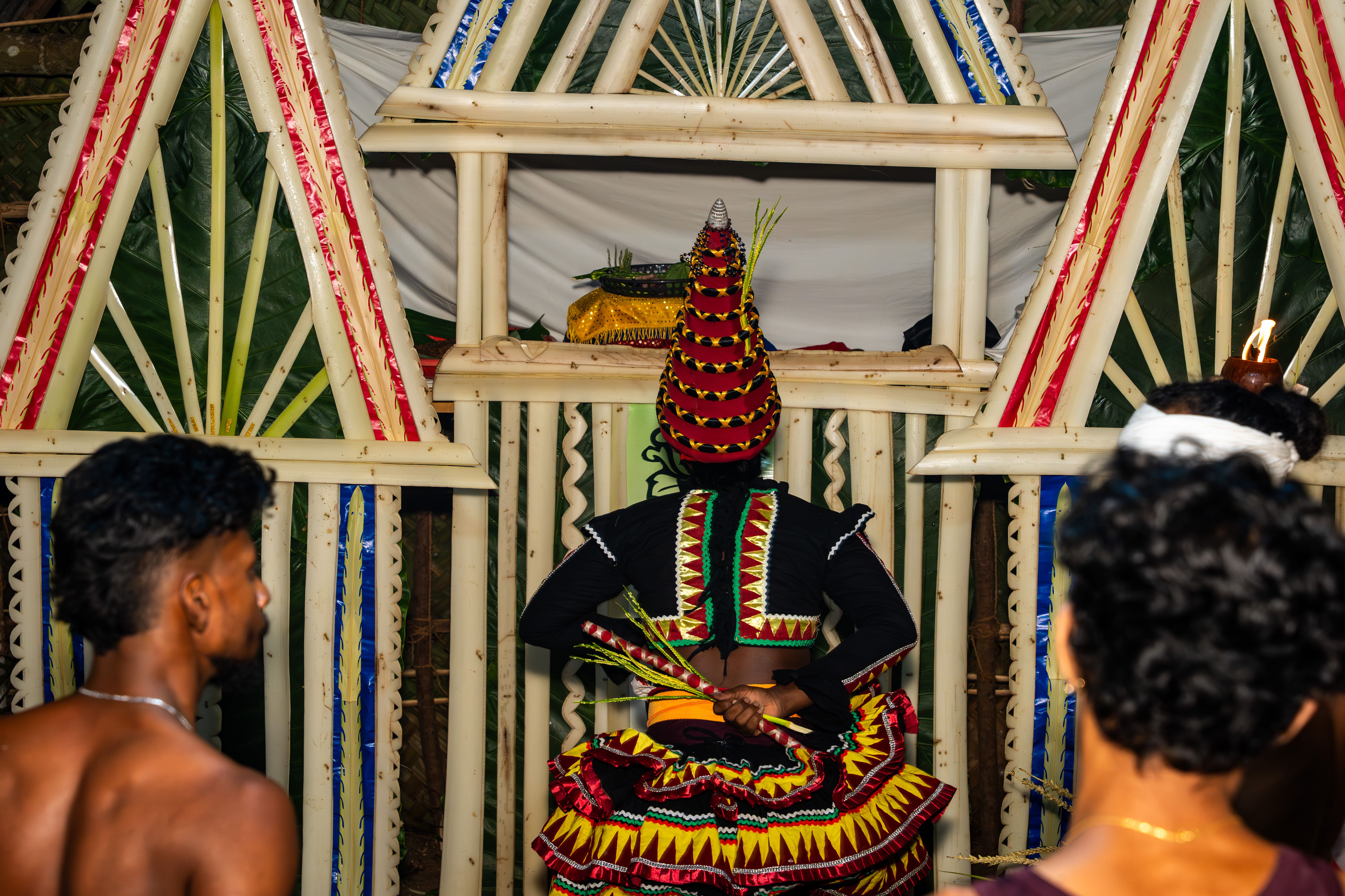 Vibrant Kandyan cultural dancers in traditional attire performing in Sri Lanka