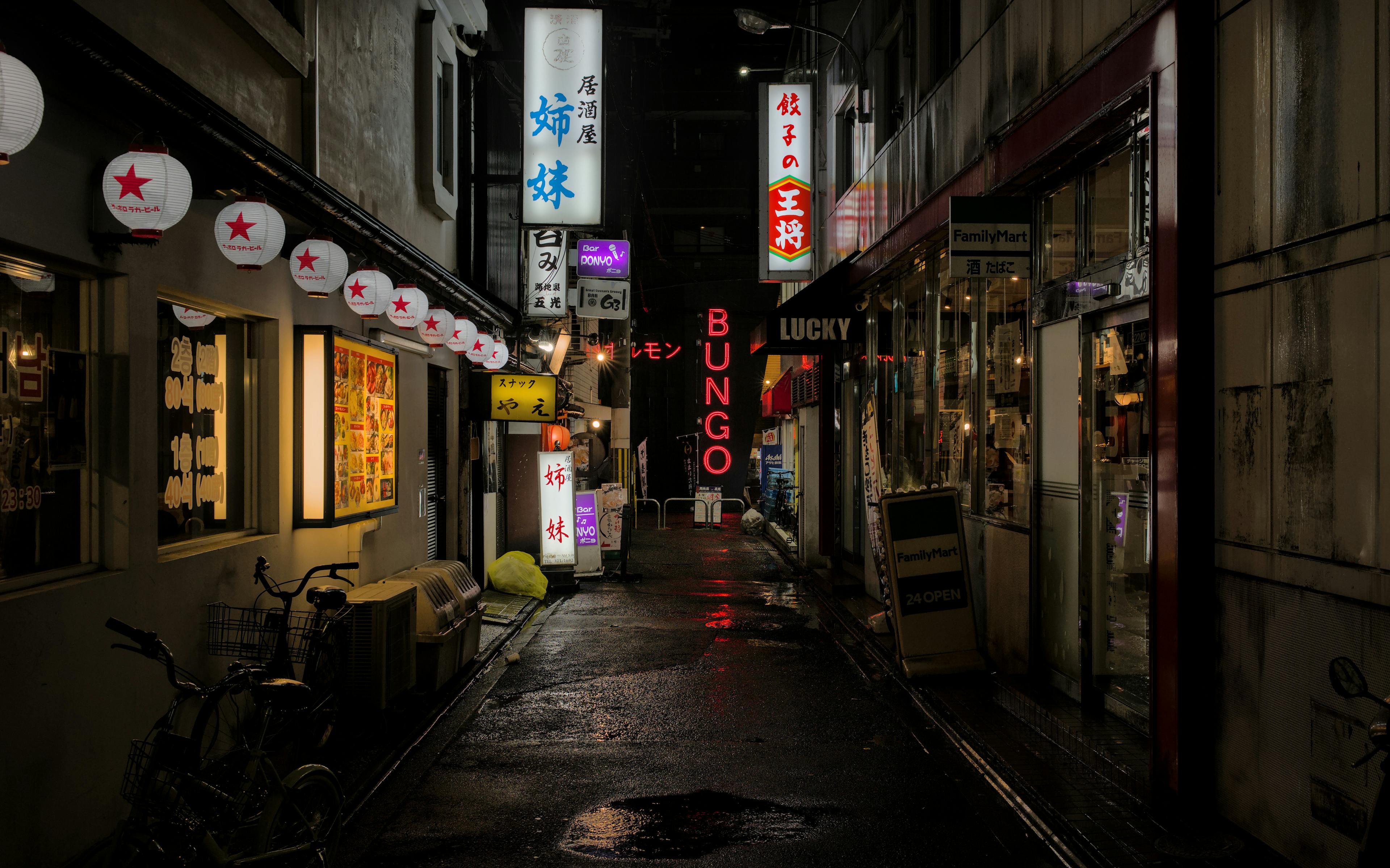Vibrant Alley in Kyoto at Night with Neon Signs