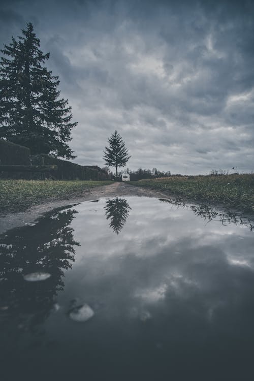 Free stock photo of blue waters, cloudy sky, land