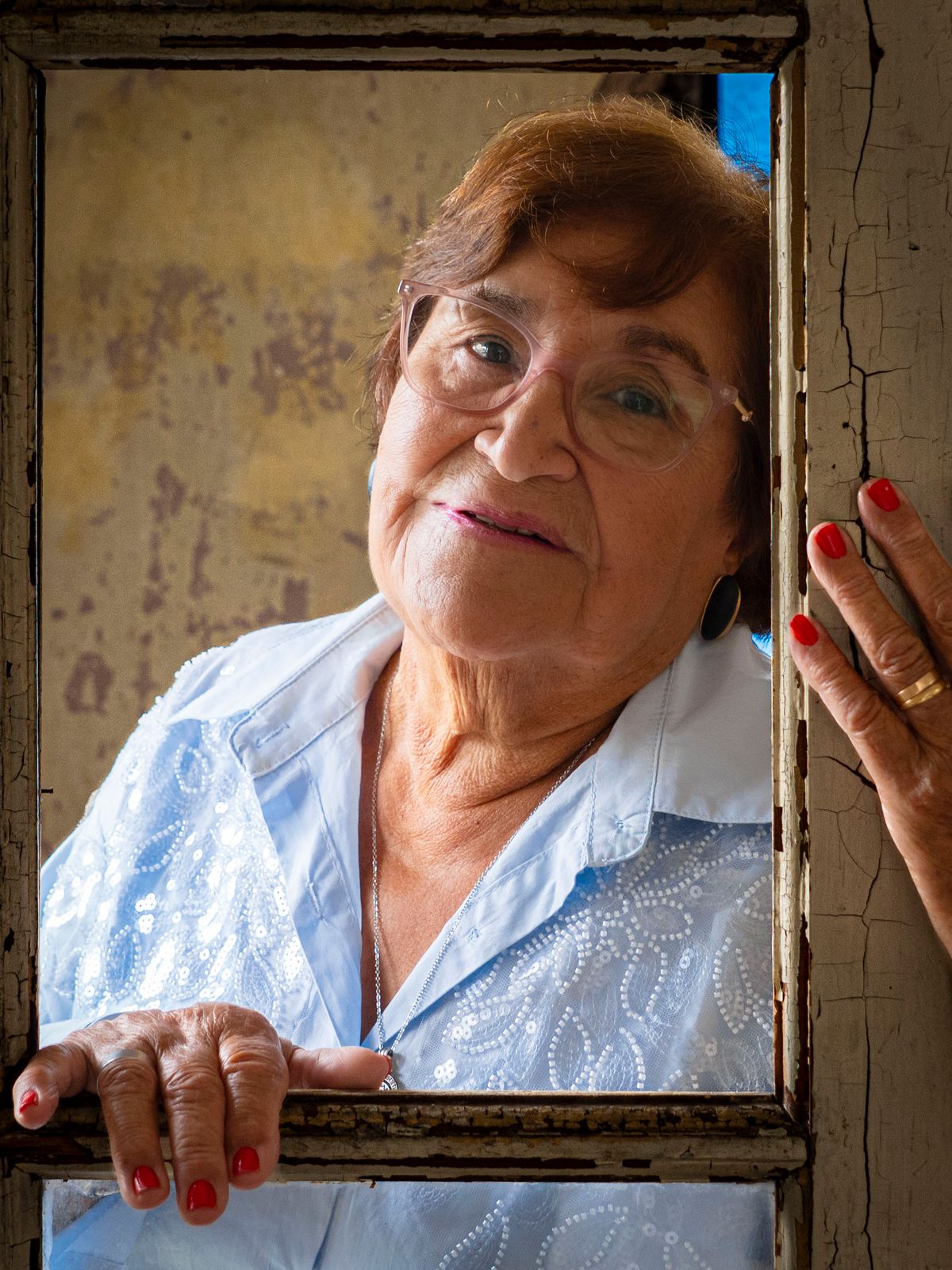 Smiling senior woman at home
