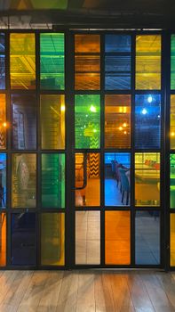 Colorful stained glass windows inside a restaurant in Kastamonu, Türkiye, adding a vibrant ambiance.