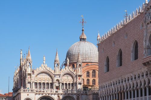 Free Capture of St. Mark's Basilica in Venice, Italy, featuring intricate architecture and blue skies. Stock Photo