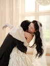 Joyful Wedding Embrace Captured Indoors