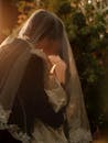 Romantic Wedding Kiss Under a Veil