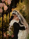 Romantic Wedding Embrace in Lush Garden Setting