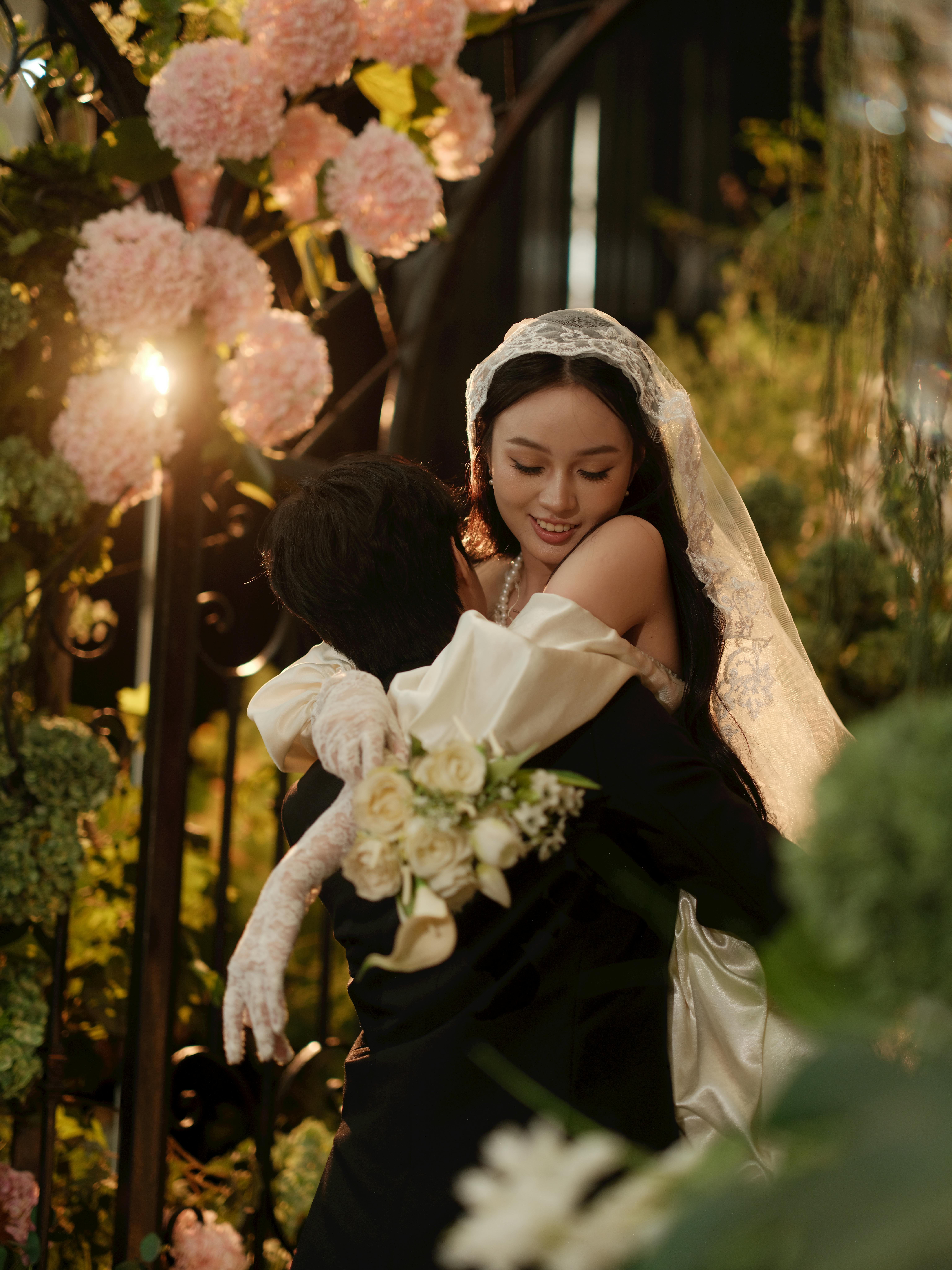 Romantic Wedding Embrace in Lush Garden Setting