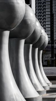 Contemporary sculptural design showcasing a row of modern structures in Pachuca, Mexico.