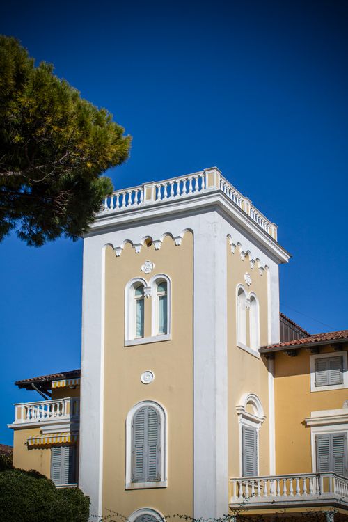 Free A beautiful architectural detail of a classic Italian building in Grado, Italy. Stock Photo