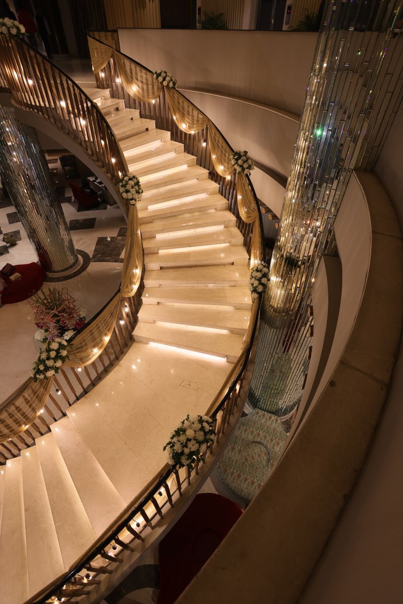 Elegant spiral staircase with floral decor