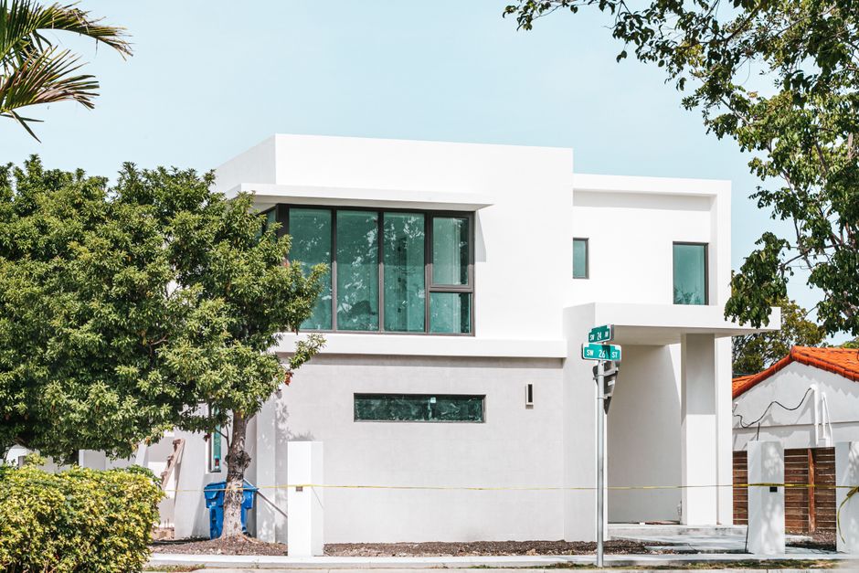 Explore this modern Miami residence with sleek lines and large glass windows.