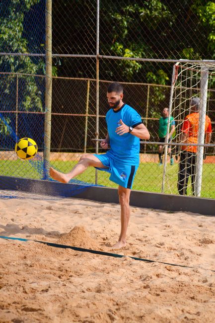 teqball player kicking ball