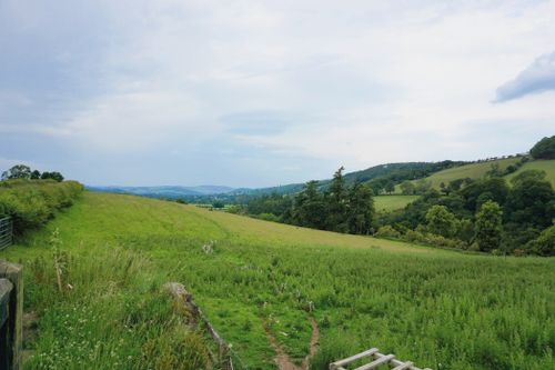 Free Breathtaking view of rolling hills and green fields near Melrose, Scotland. Stock Photo