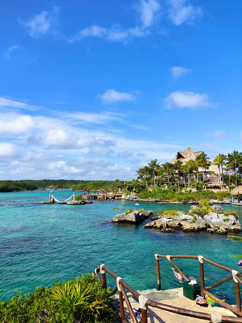 Free Vibrant and sunny coastline vista of Tulum, capturing crystal clear waters and lush greenery. Stock Photo