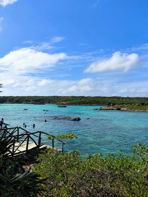 Free Explore the clear blue waters and lush greenery of Tulum, Mexico, ideal for relaxation. Stock Photo