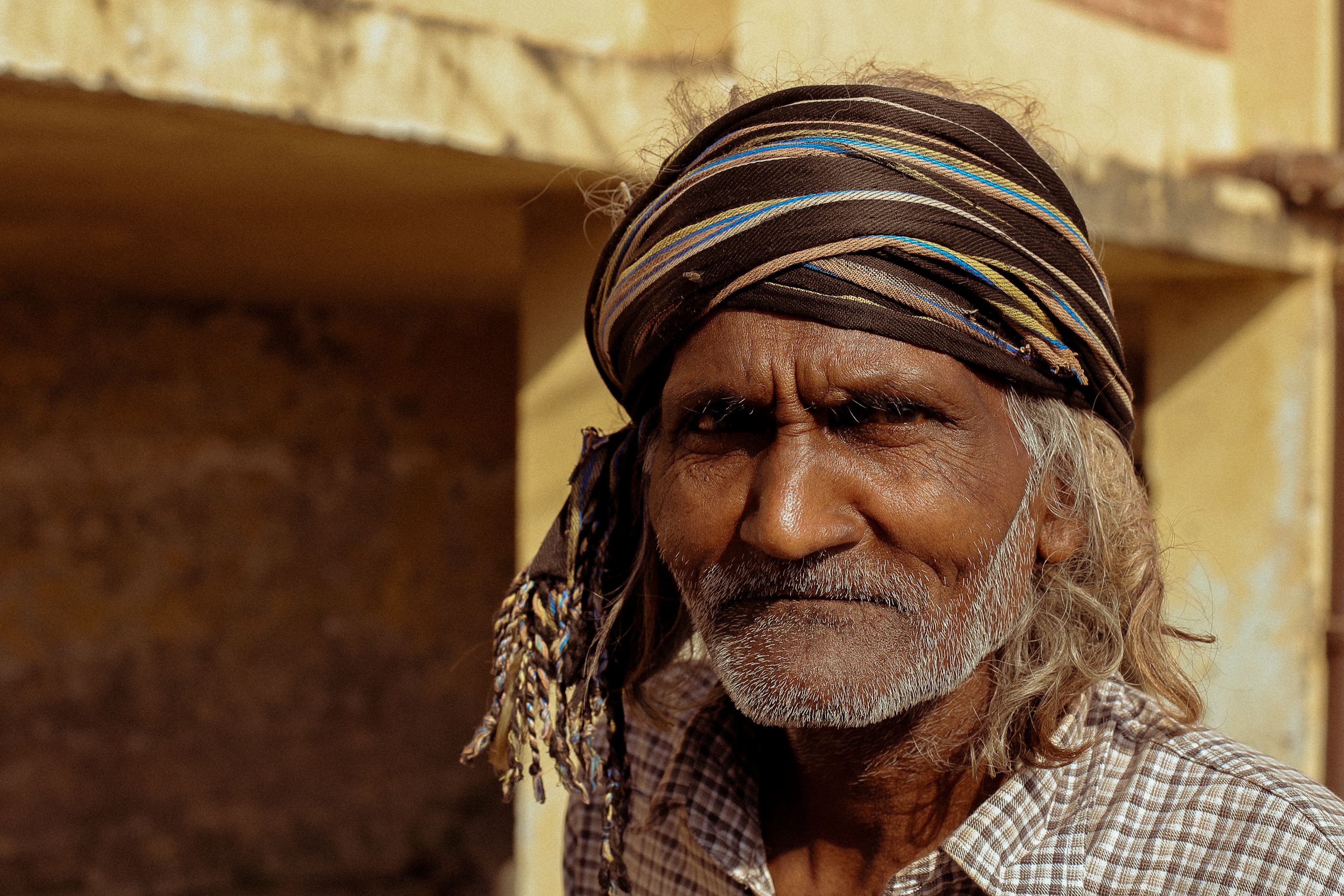 Portrait of Senior Man Outdoors in Traditional Attire · Free Stock Photo