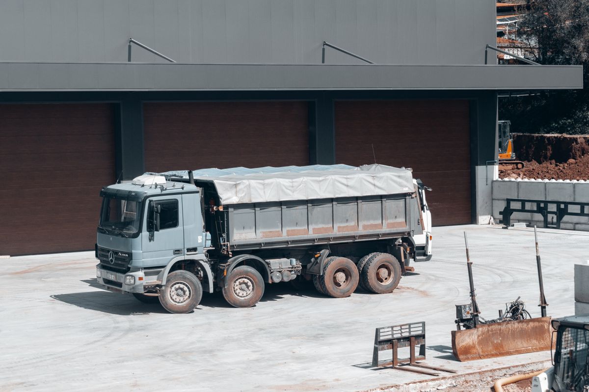 Dump truck at loading facility