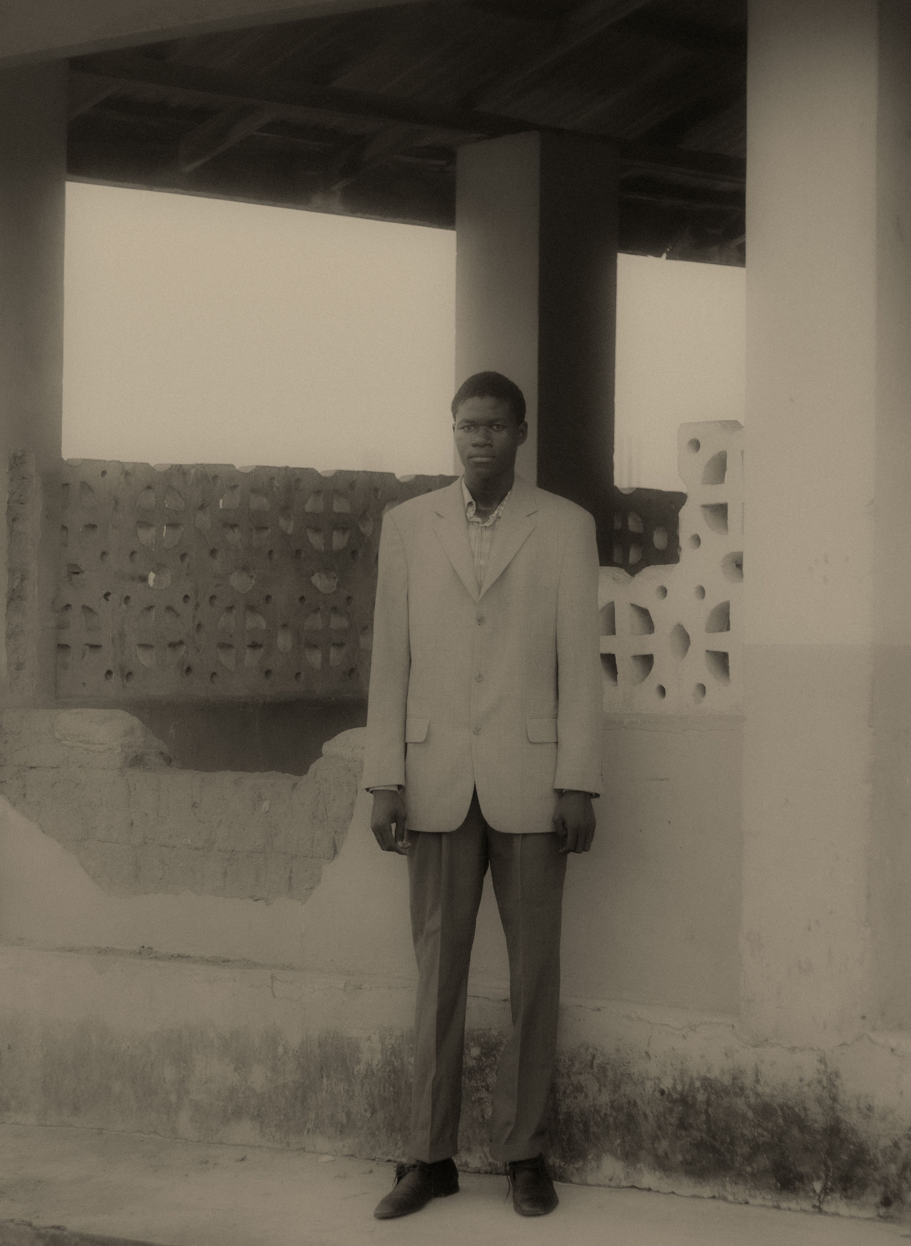 Vintage Portrait of Man in Urban Setting · Free Stock Photo