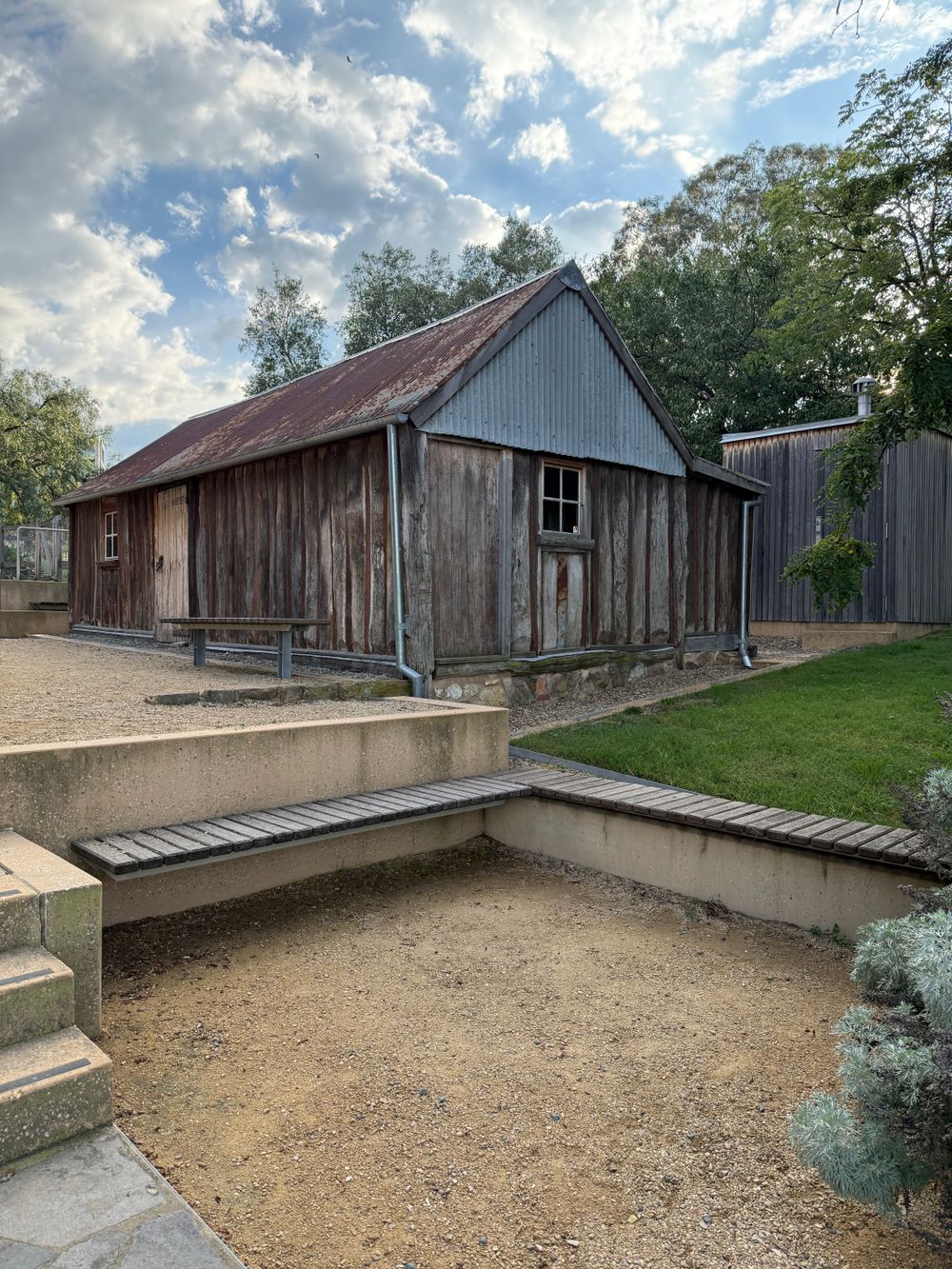 Rustic wooden barn with weathered exterior siding
