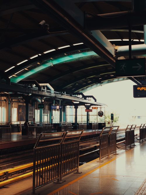 Free A serene view of a train station platform in Bengaluru, highlighting modern architecture. Stock Photo
