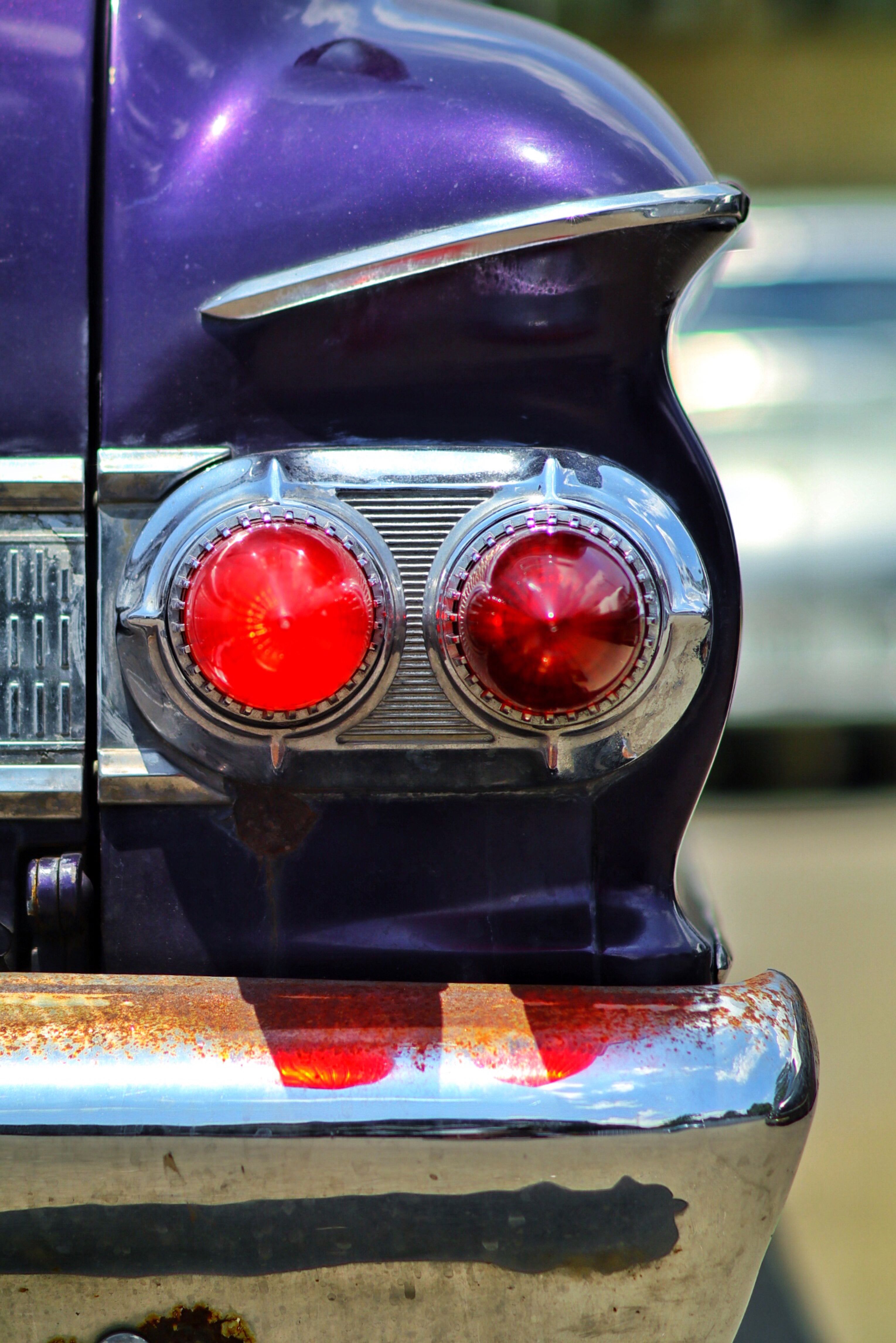 Yellow Car with a Shiny Tail Light · Free Stock Photo