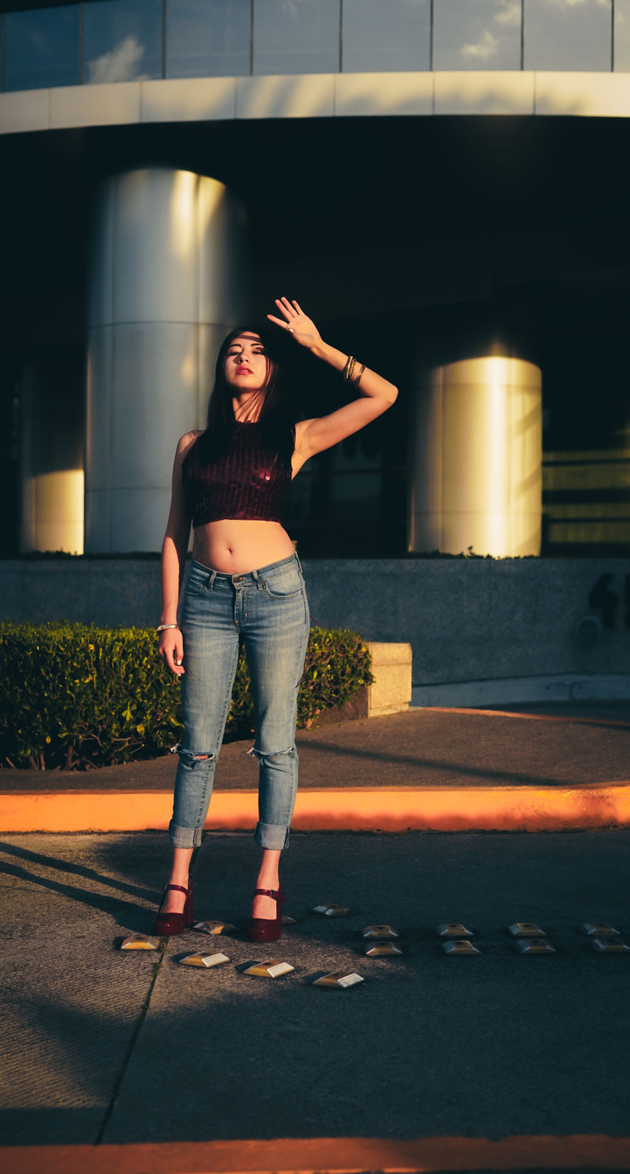 Stylish Woman Posing Outdoors in Urban Setting · Free Stock Photo