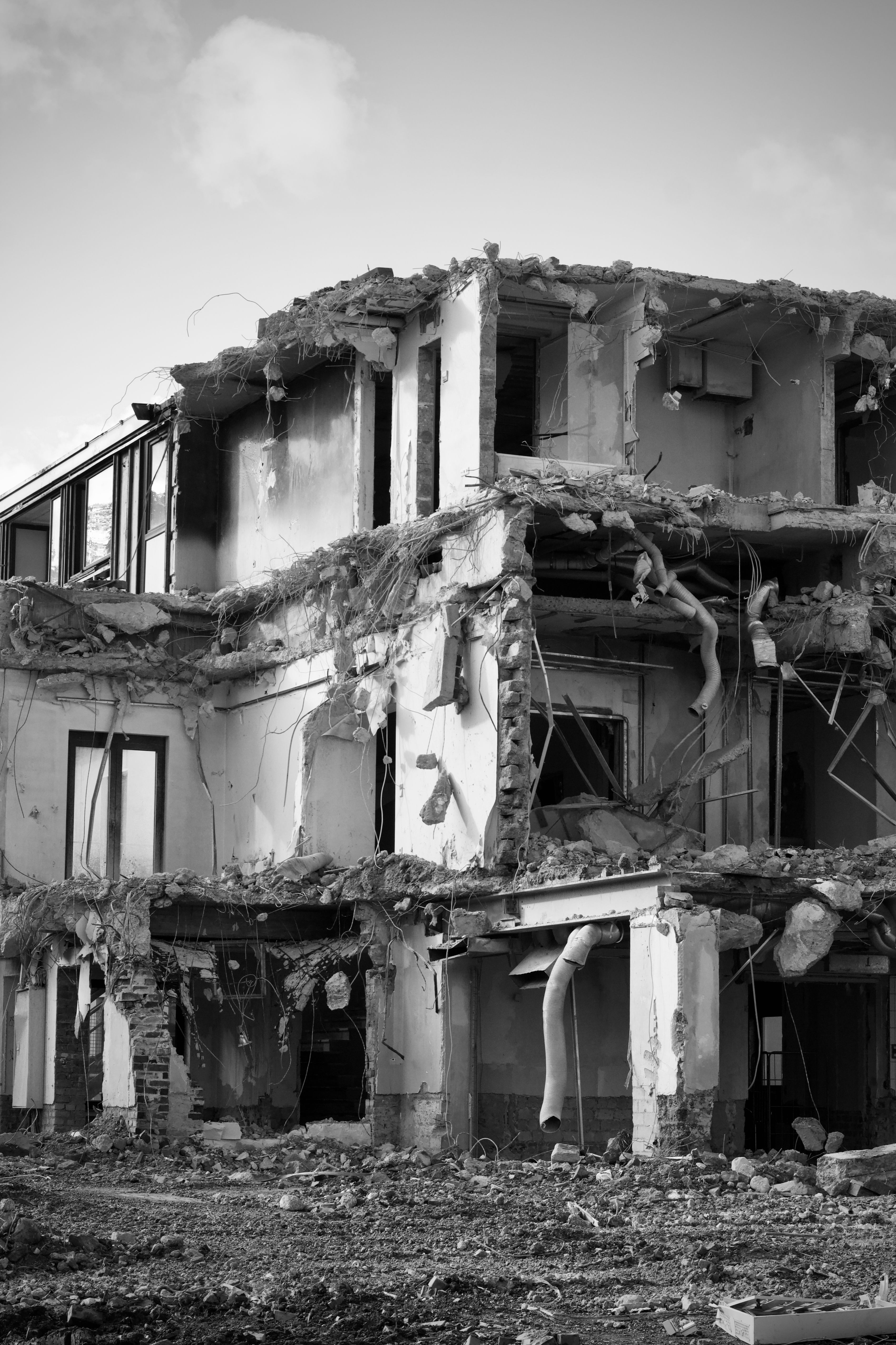 An aging building showing wear before redevelopment, similar to older structures near the Water Street District in Henderson