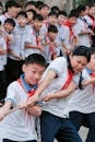 Children Playing Tug-of-War in School Event