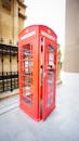 Classic Red Telephone Box on City Street