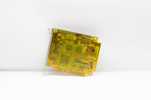 Free Close-up of a vintage circuit board showcasing retro technology and design. Stock Photo