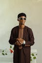 Man in Traditional African Attire with Sunglasses
