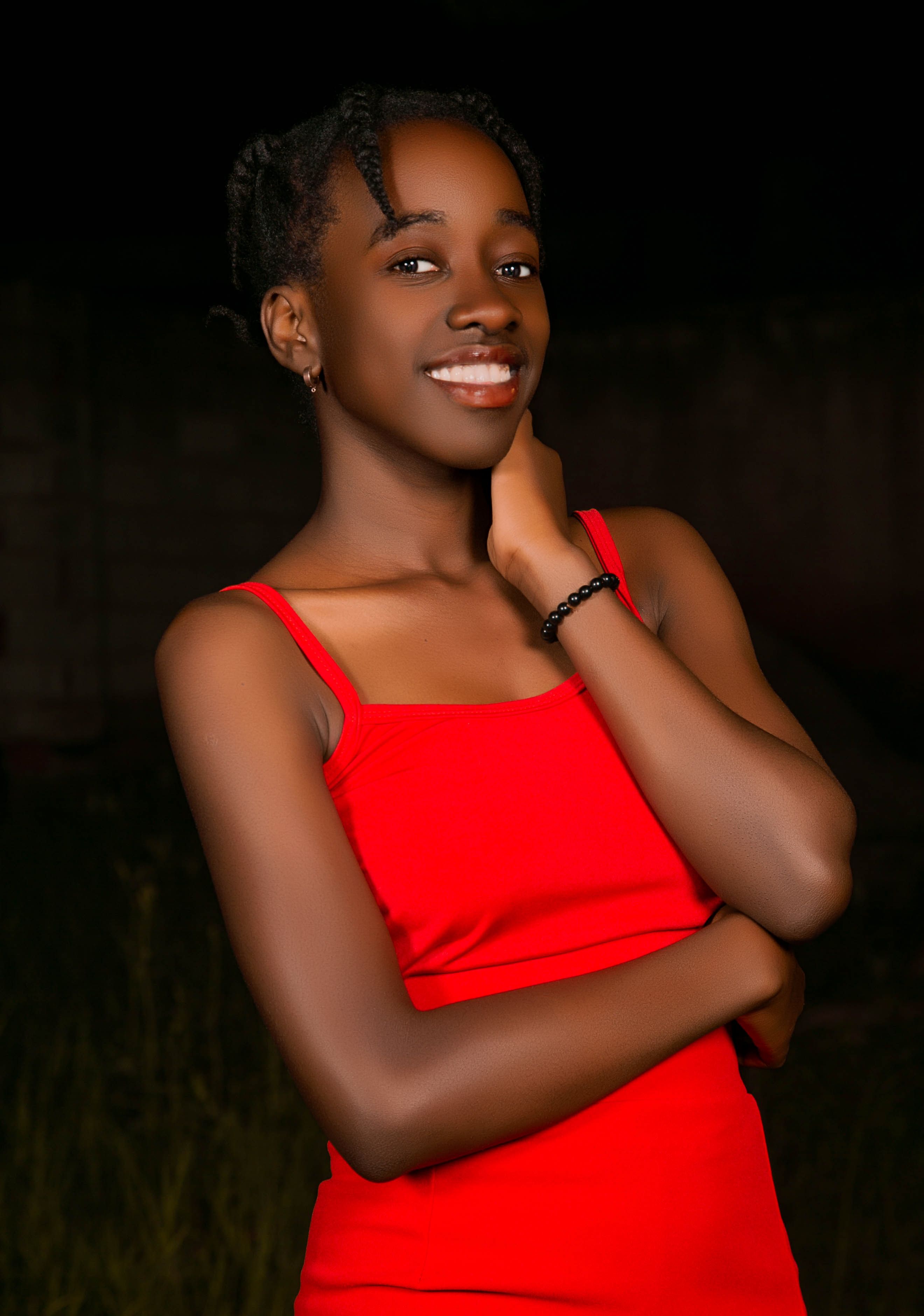 Portrait of Smiling Woman in Red Dress at Night · Free Stock Photo